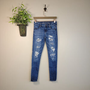 American Eagle Jeans Jeggings Skinny Distressed Mid Rise Medium Blue Wash AE 4